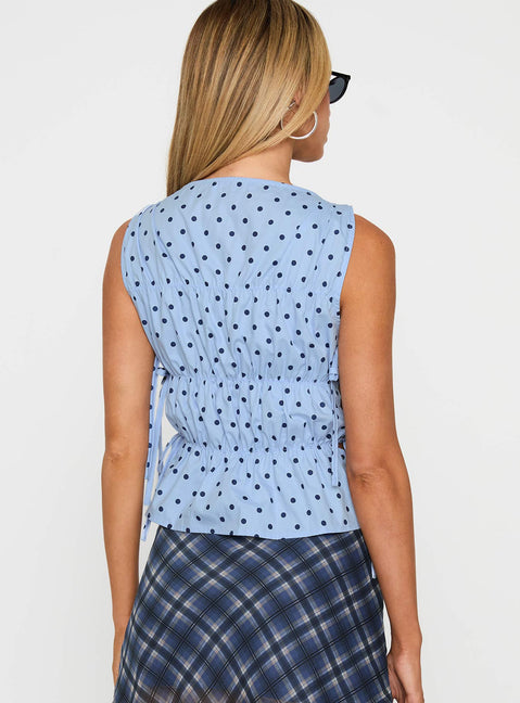 back view of model wearing Princess Polly Endless Summers Tie Side Top Blue Polka Dot Sleeveless Boat Neck 