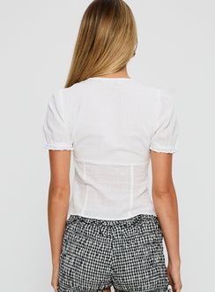 back view of model wearing Princess Polly Gleaming Bow Detail Button Up Top White Short Sleeves Crew Neck 