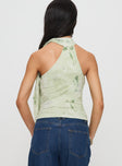 back view of model wearing Princess Polly Anderstone Neck Tie Top Green Sleeveless Asymmetric Neckline 