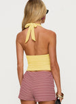 back view of model wearing Princess Polly Whimsy Halter Top Lemon Sleeveless Plunger 