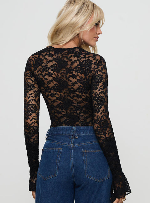 back view of model wearing Princess Polly Giallo Long Sleeve Bodysuit Black Full Sleeves 