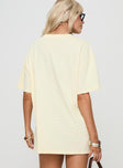 back view of model wearing Princess Polly Hotel Hawaii Oversized Tee Yellow Half Sleeves Crew Neck 