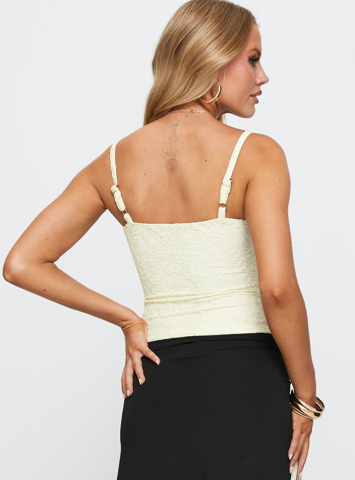 back view of model wearing Princess Polly Beacall Top Cream Sleeveless Scoop Neck 