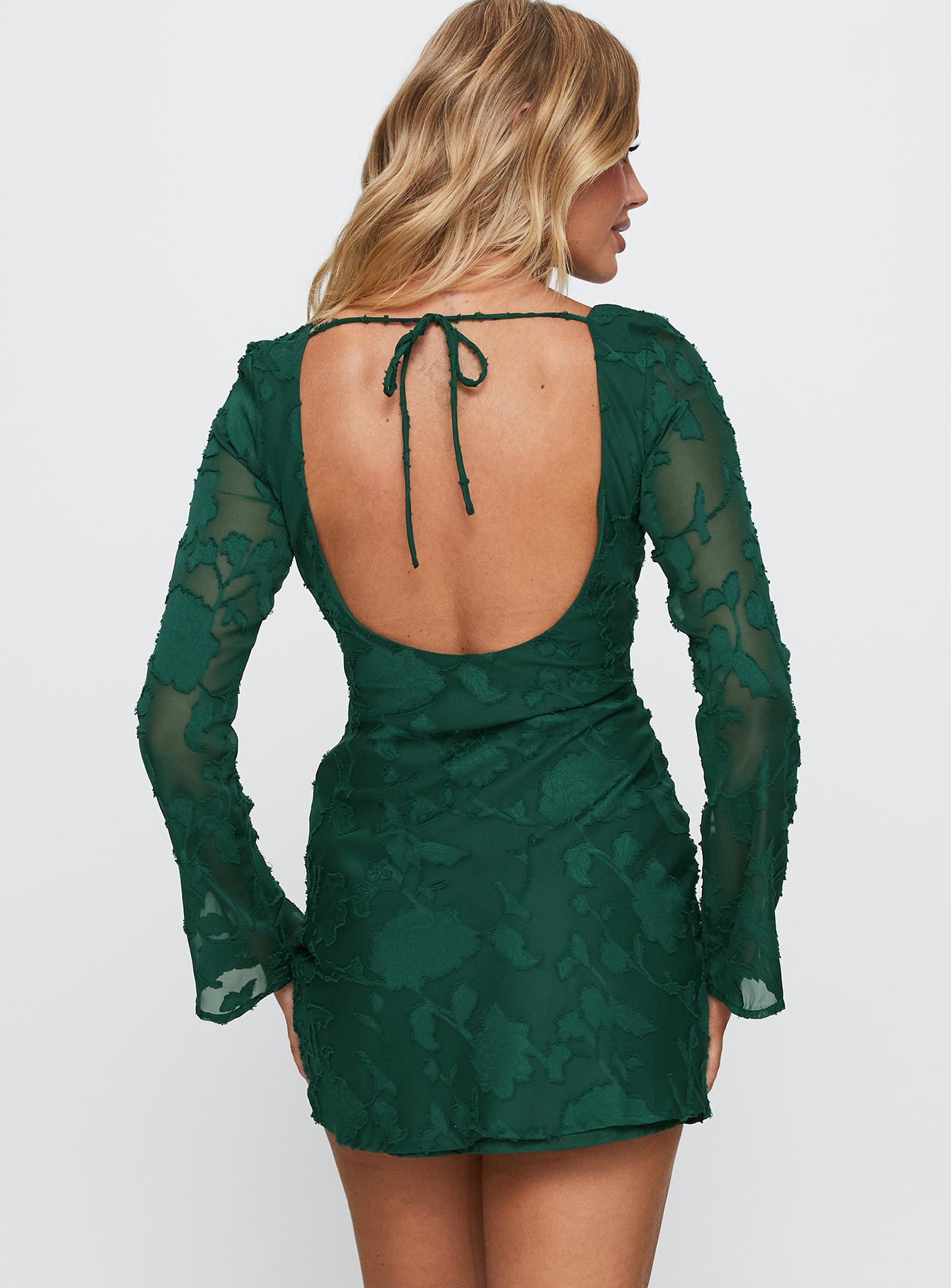 back view of model wearing Princess Polly Jadee Long Sleeve Mini Dress Green Burnout Crew Neck 