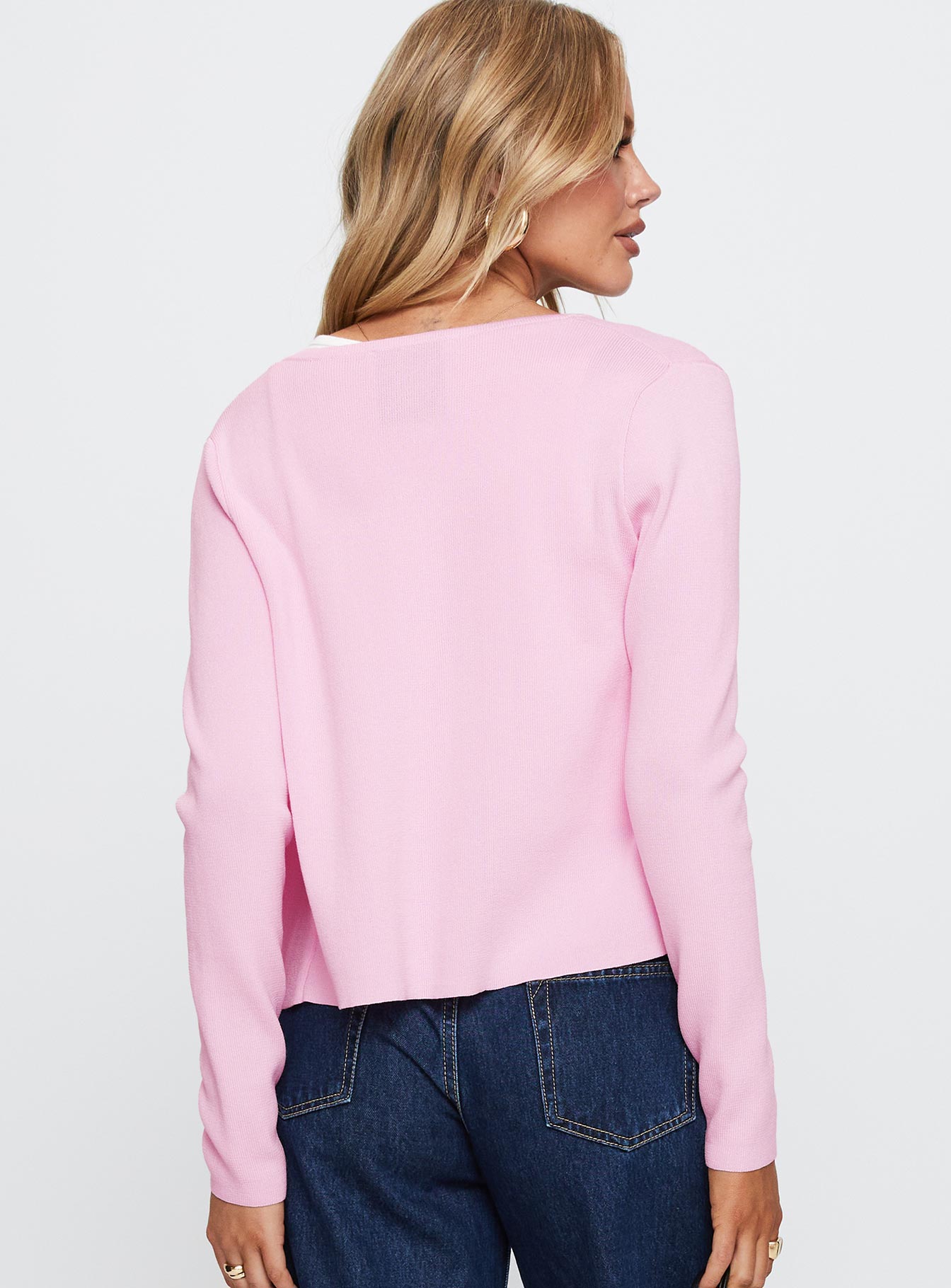 back view of model wearing Princess Polly Old Burlington Knit Cardigan Pink Cropped 