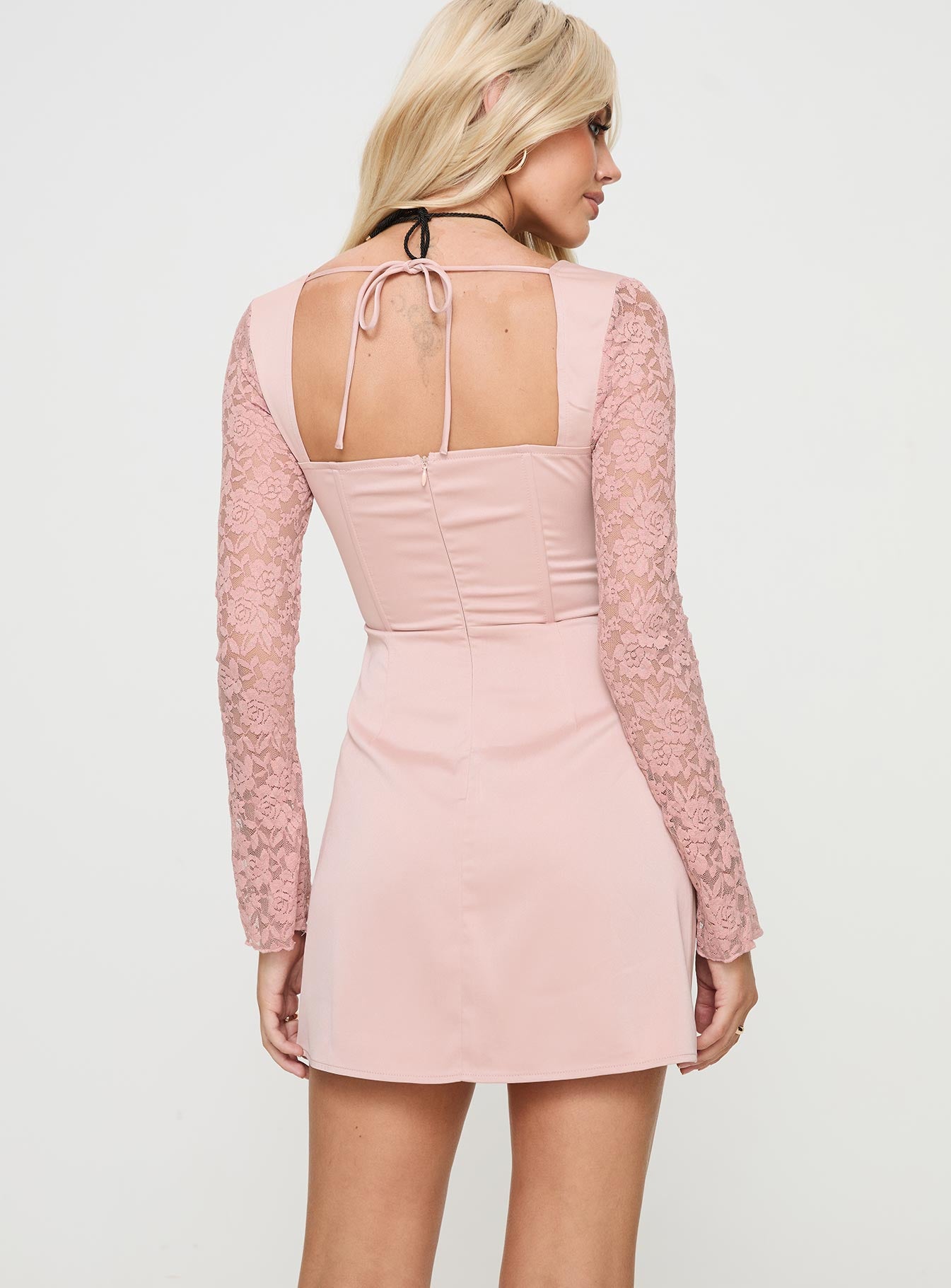 back view of model wearing Princess Polly Markwell Long Sleeve Mini Dress Pink Sweetheart Neckline 