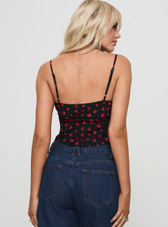 back view of model wearing Princess Polly Fondar Top Black Sleeveless Plunger 