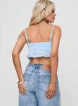 back view of model wearing Princess Polly Flicker Top Blue Sleeveless Sweetheart 