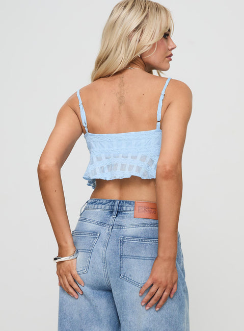 back view of model wearing Princess Polly Flicker Top Blue Sleeveless Sweetheart 