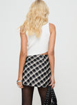 back view of model wearing Princess Polly Amaranthine Mini Skirt Cream/Navy Check Mini Skirts 