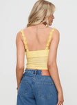 back view of model wearing Princess Polly Franca Top Yellow Sleeveless Sweetheart 