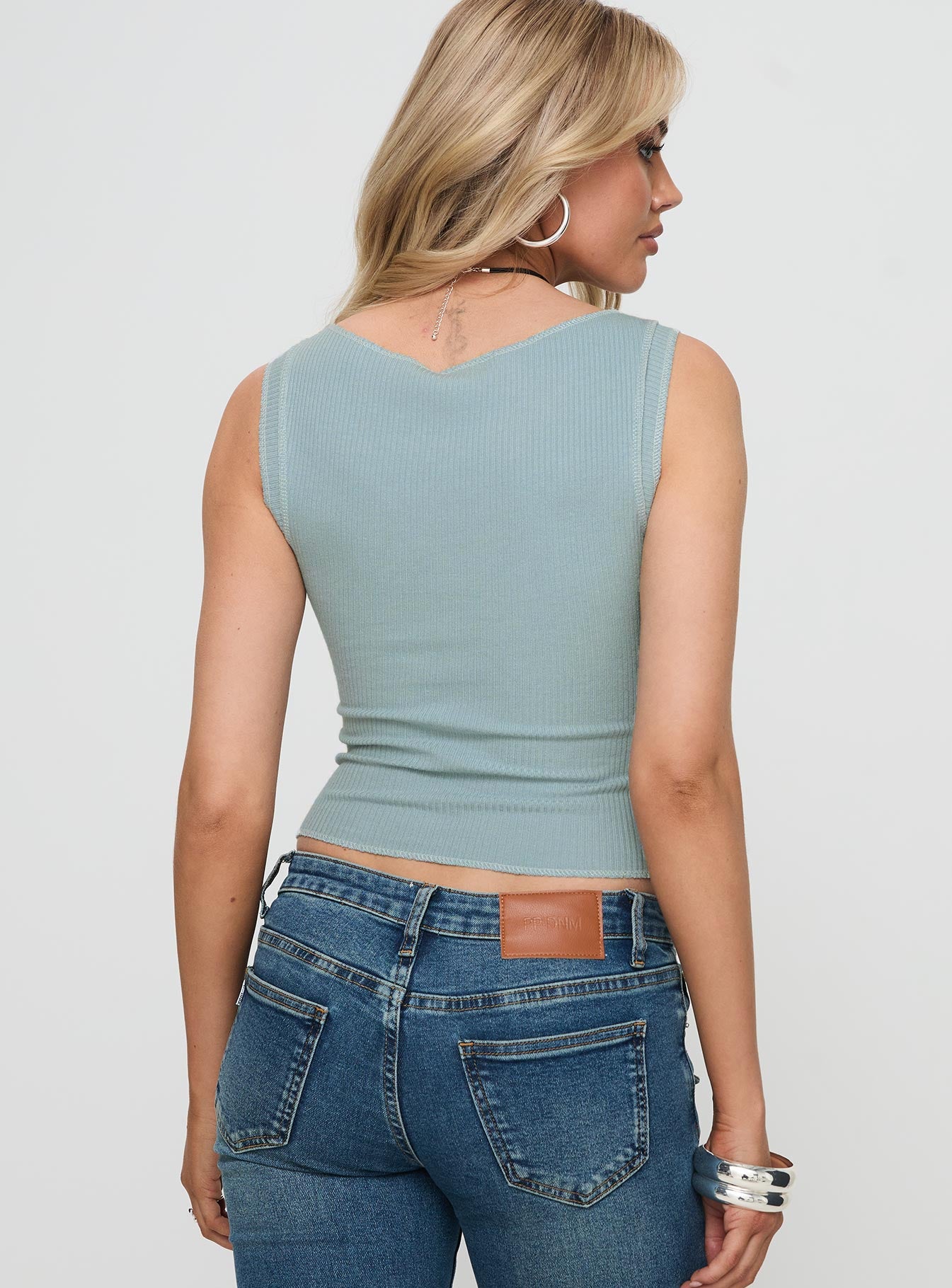 back view of model wearing Princess Polly Casado Top Blue Sleeveless Crew Neck 