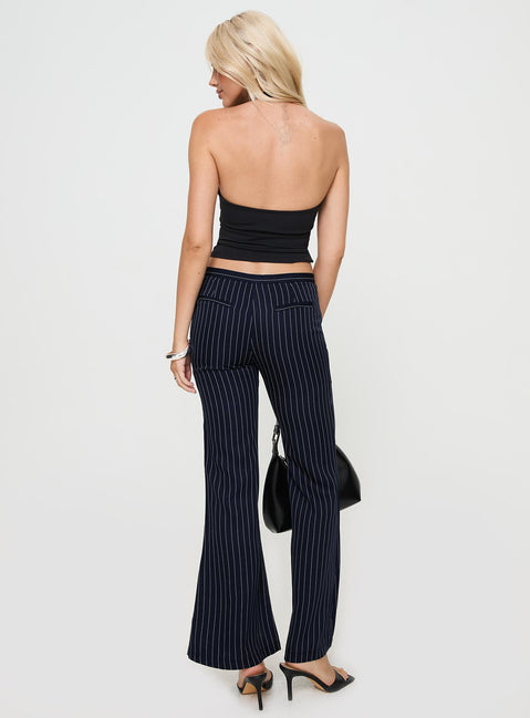 back view of model wearing Princess Polly No One Low Waist Pinstripe Pants Navy Mid Rise 