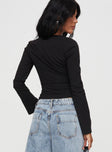 back view of model wearing Princess Polly Linsley Long Sleeve Top Black Full Sleeves Square Neck 