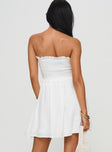 Strapless mini dress Elasticated band at bust, shirred material, frill detail Non-stretch material, fully lined  