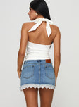 back view of model wearing Princess Polly Miyuki Denim Mini Skirt Mid Wash Mini Skirts 