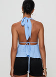 back view of model wearing Princess Polly Saddler Halter Top Blue Sleeveless Plunger 