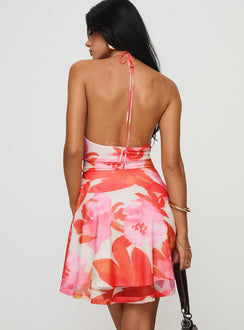 back view of model wearing Princess Polly Lindberg Halter Mini Dress Floral Multi Cowl Neck 