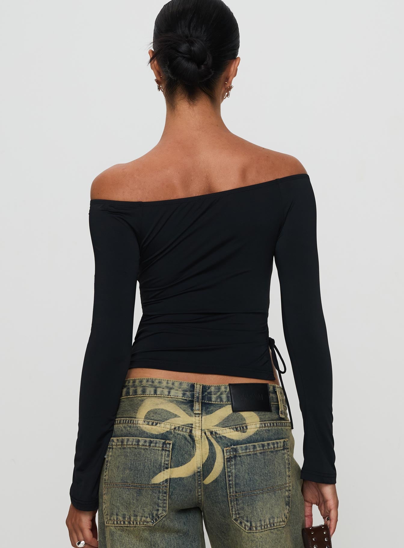 back view of model wearing Princess Polly Endellion Off Shoulder Long Sleeve Top Black Full Sleeves straight 