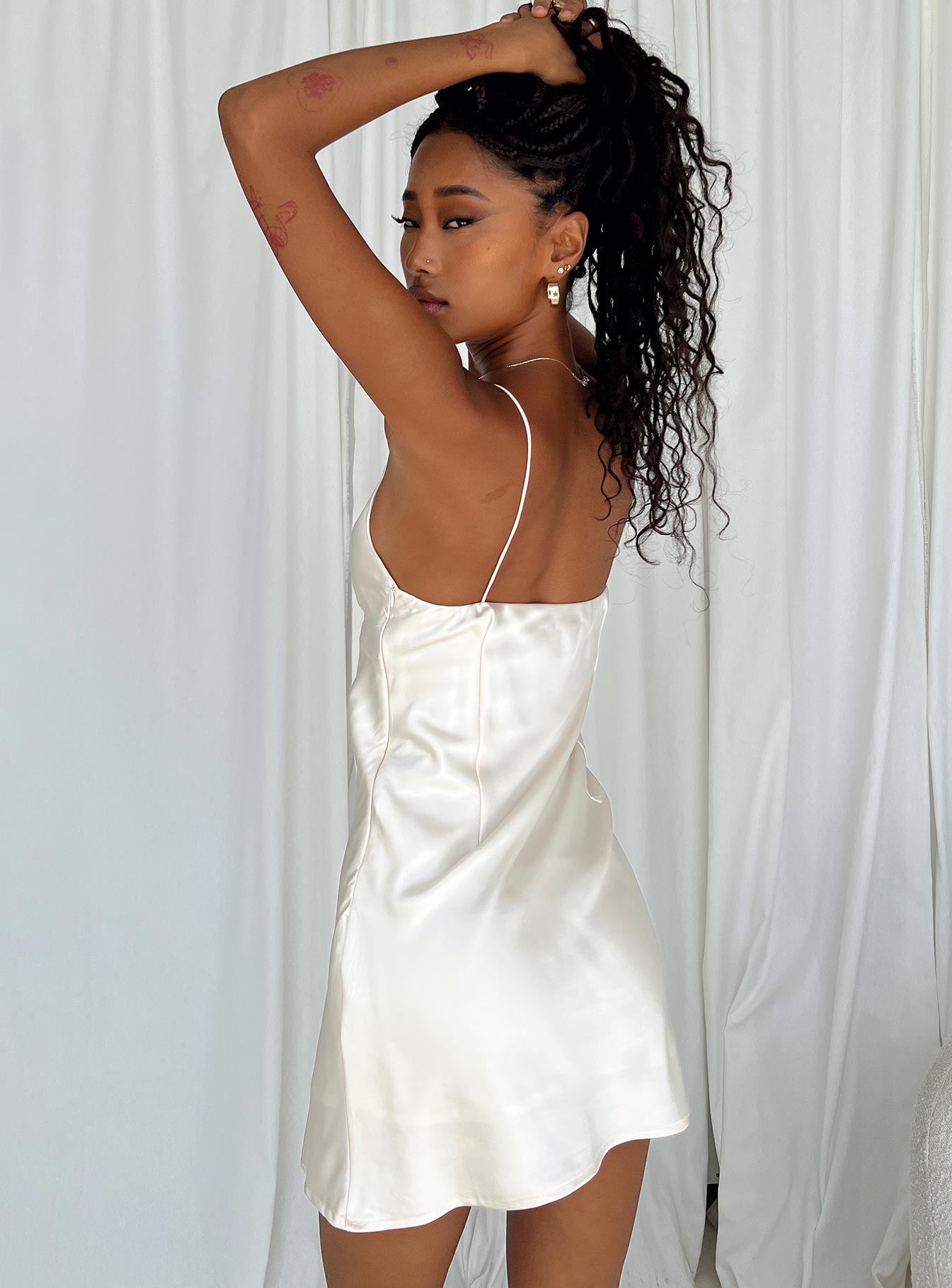 Front view of model wearing  front Princess Polly Square Neck  Marilyn Mini Dress Champagne