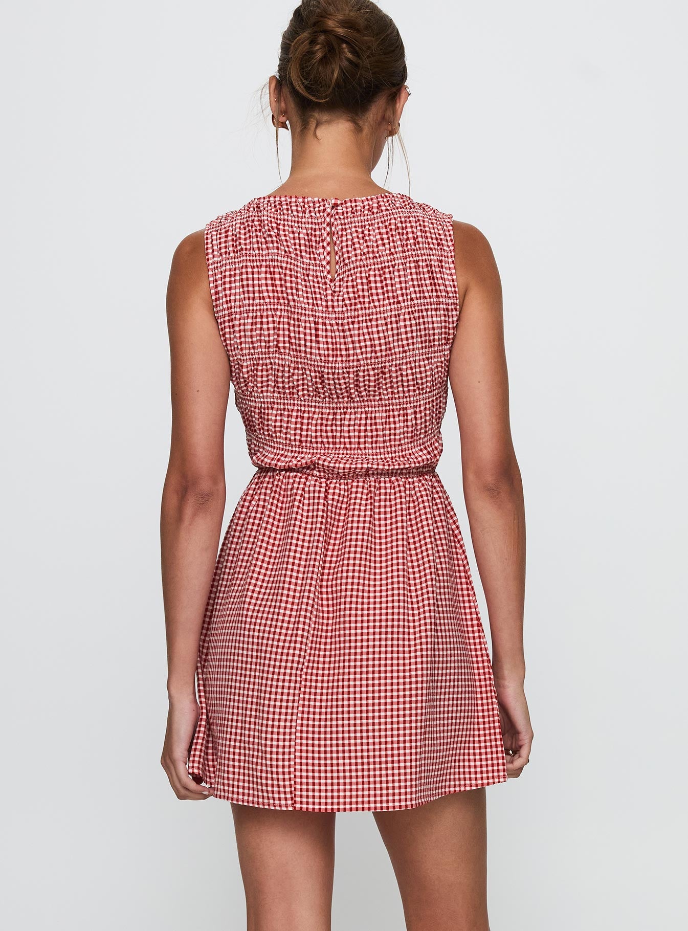 back view of model wearing Princess Polly Winxie Shirred Mini Dress Red Gingham Scoop Neck 