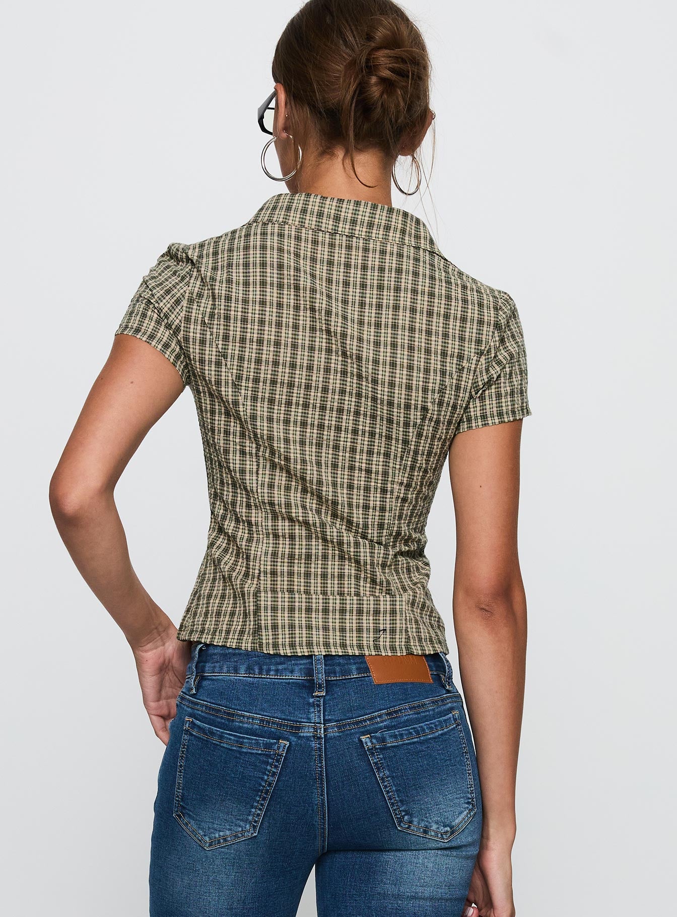 back view of model wearing Princess Polly Alma Mater Top Green Check Short Sleeves V-Neck 