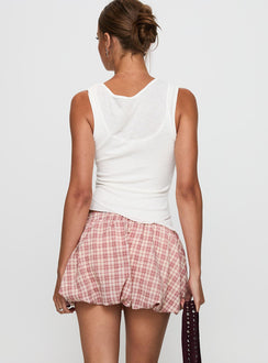 back view of model wearing Princess Polly Cydnee Bubble Hem Mini Skort Red Multi Low Rise Shorts 