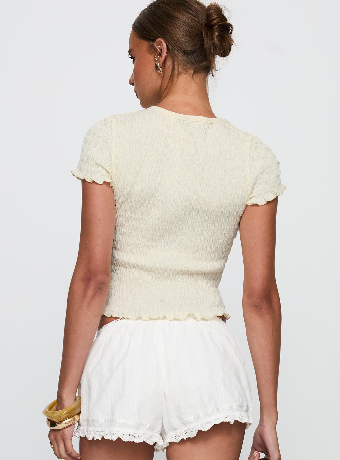 back view of model wearing Princess Polly Ciao Bella Shirred Graphic Top Cream Short Sleeves Crew Neck 