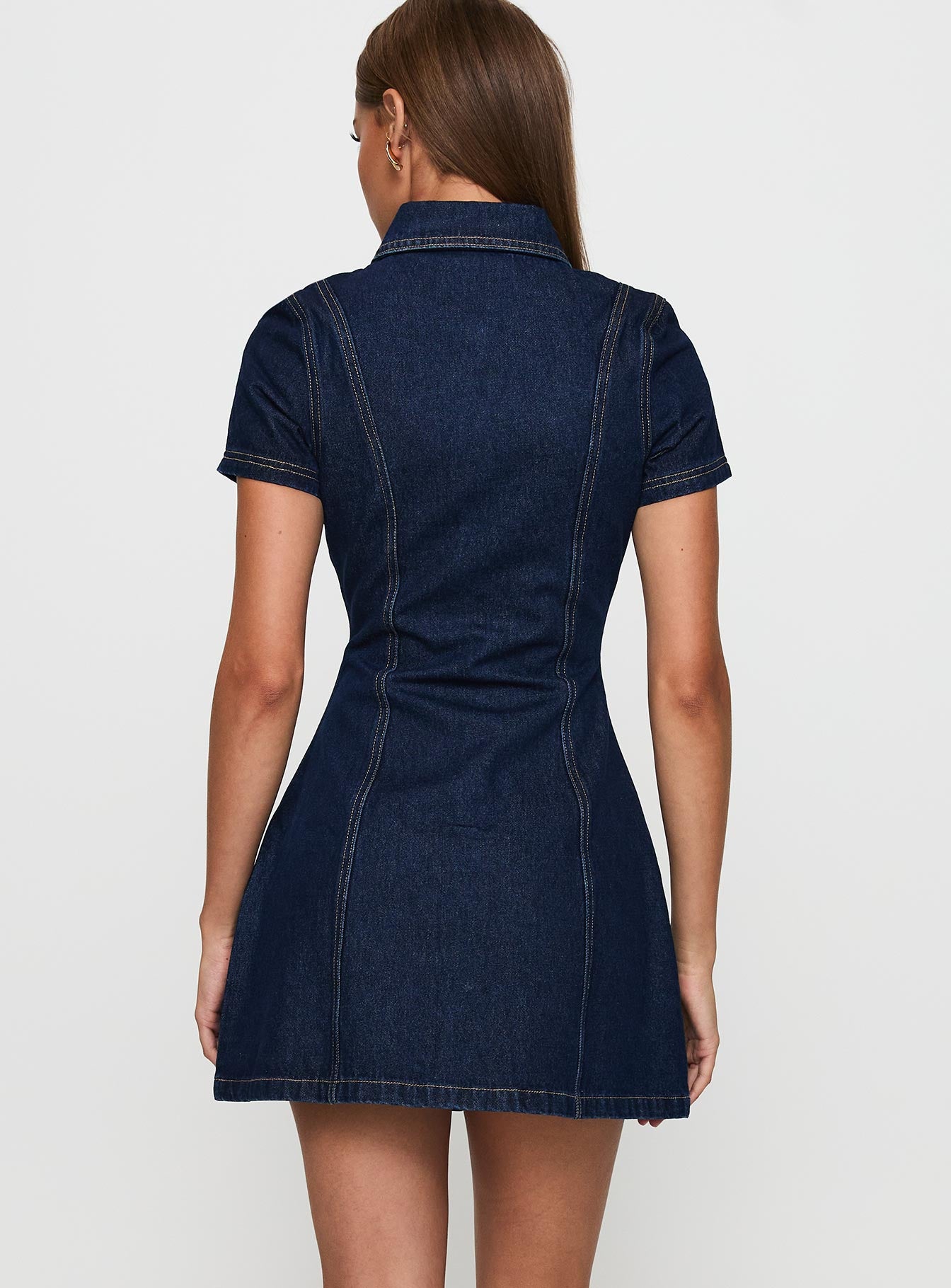 back view of model wearing Princess Polly Perception Denim Mini Dress Mid Wash High Neck 