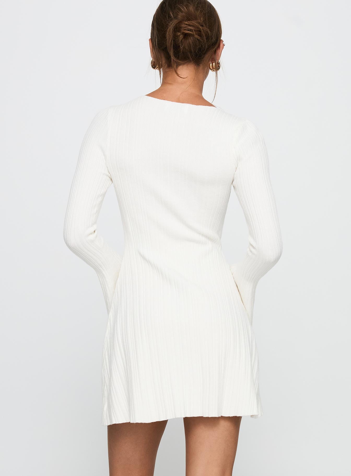 back view of model wearing Princess Polly Terraces Long Sleeve Mini Dress White High Neck 