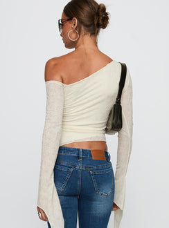 back view of model wearing Princess Polly Face Card Long Sleeve Top Cream Full Sleeves Asymmetric Neckline 