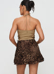 back view of model wearing Princess Polly Luned Mini Skirt Leopard Petite Mini Skirts 