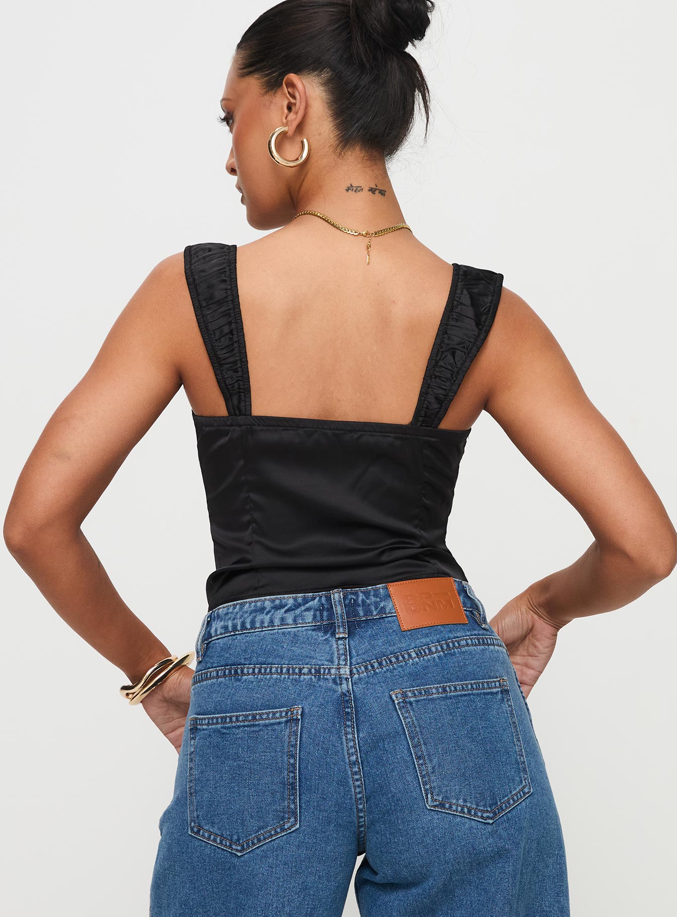 back view of model wearing Princess Polly Arvelin Corset Top Black Sleeveless Sweetheart 