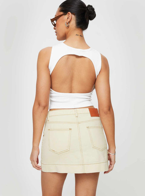 back view of model wearing Princess Polly Hughes Mini Skirt Cream Denim Mini Skirts 