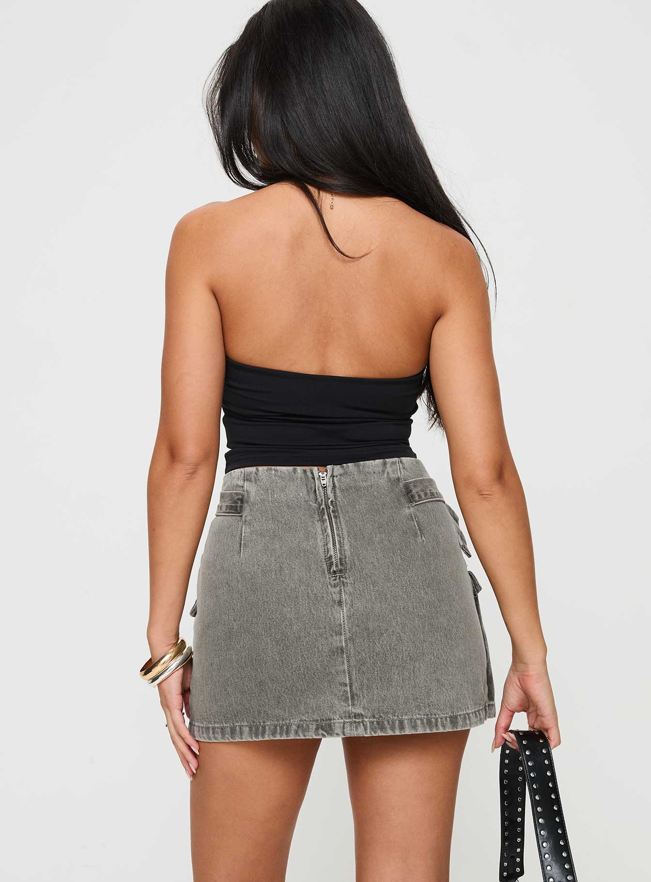 back view of model wearing Princess Polly Bambas Wrap Denim Mini Skirt Washed Green Mini Skirts 