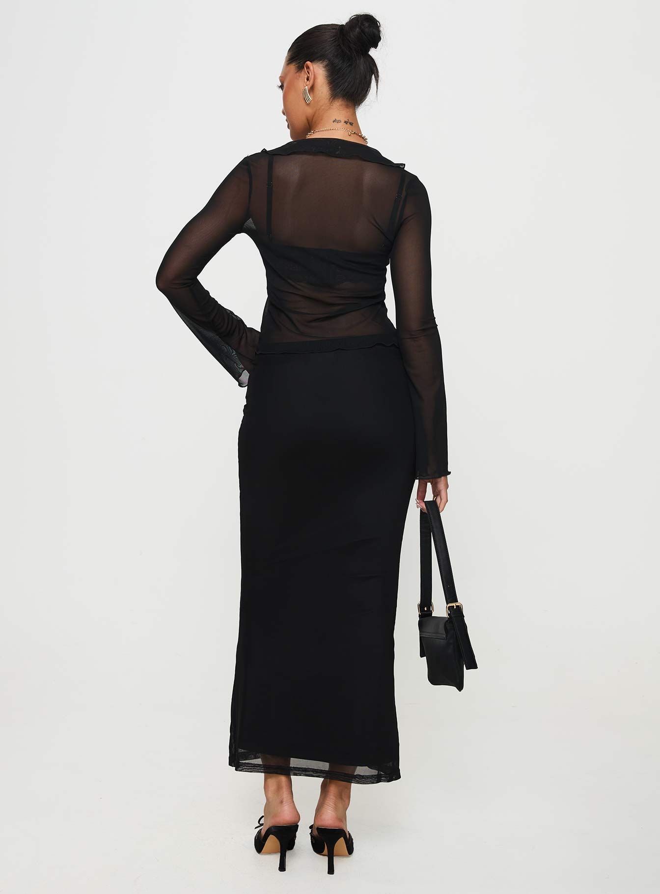 back view of model wearing Princess Polly Colombo Maxi Skirt Black Maxi 