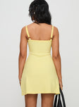 back view of model wearing Princess Polly Baseline Rib Mini Dress Yellow Scoop Neck 