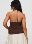 back view of model wearing Princess Polly Gadot Halter Top Brown Sleeveless Plunger 