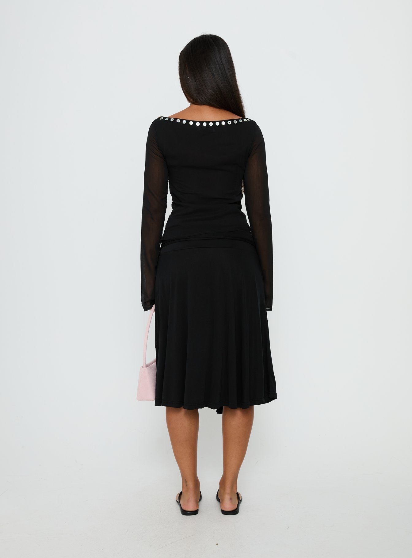 back view of model wearing Princess Polly Joaney Tie Side Jersey Midi Skirt Black Midi Skirts 