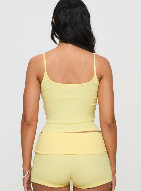 back view of model wearing Princess Polly Baseline Rib Top Yellow Sleeveless Square Neck 