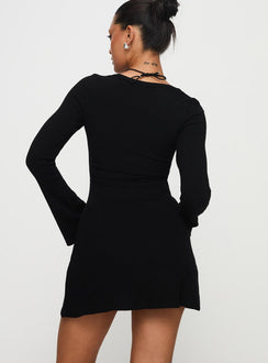 back view of model wearing Princess Polly Best Interest Long Sleeve Mini Dress Black Tall Scoop Neck 