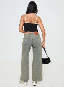 back view of model wearing Princess Polly Jaycee Low Rise Wide Leg Jeans Antique Wash Low Rise Jeans 