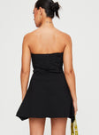 back view of model wearing Princess Polly Bradwell Strapless Mini Dress Black Petite Straight Neck 