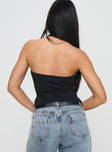 back view of model wearing Princess Polly Stand By Halter Top Black Sleeveless V-Neck 