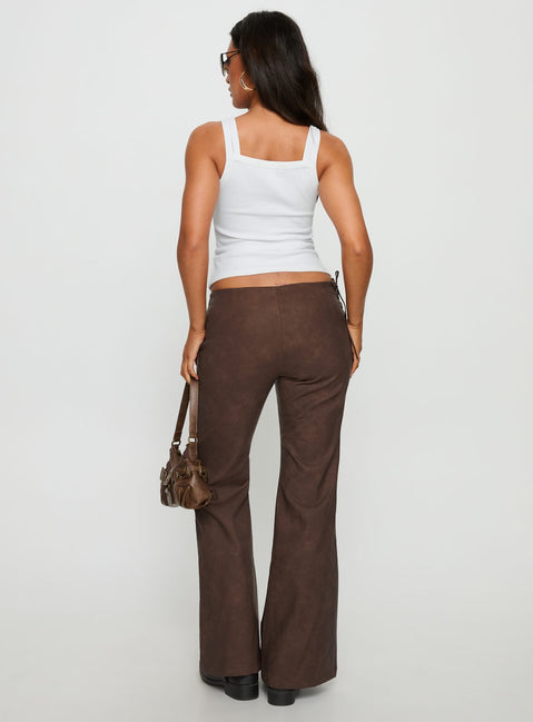 back view of model wearing Princess Polly Trickrider Tie Side Faux Leather Pants Chocolate Mid Rise Pants 