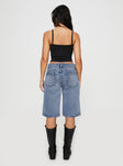 back view of model wearing Princess Polly Kurt Denim Culottes Acid Wash Low Rise Shorts 