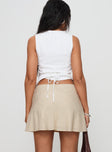 back view of model wearing Princess Polly Dapple Bias Mini Skirt Beige Mini Skirts 