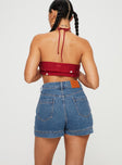 back view of model wearing Princess Polly Gazelle Denim Skort Mid Wash Lower Impact 