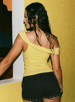 back view of model wearing Princess Polly Out Of Office Off Shoulder Top Yellow Sleeveless Asymmetric Neckline 