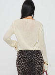 back view of model wearing Princess Polly Big Star Knit Sweater Cream Cropped 